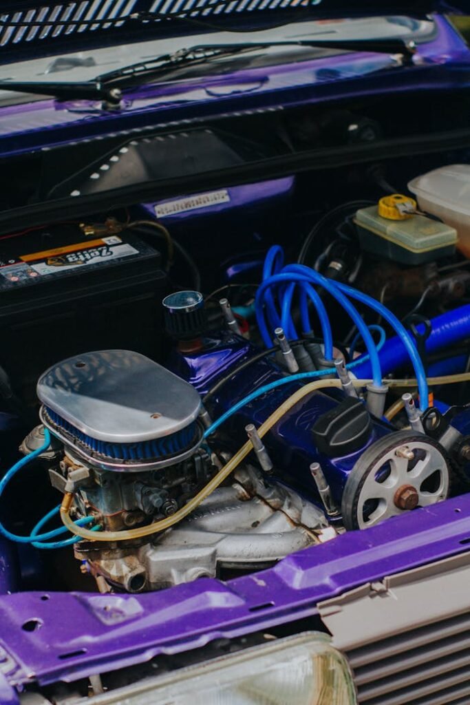 Close-up view of a car engine showcasing various components and piping.